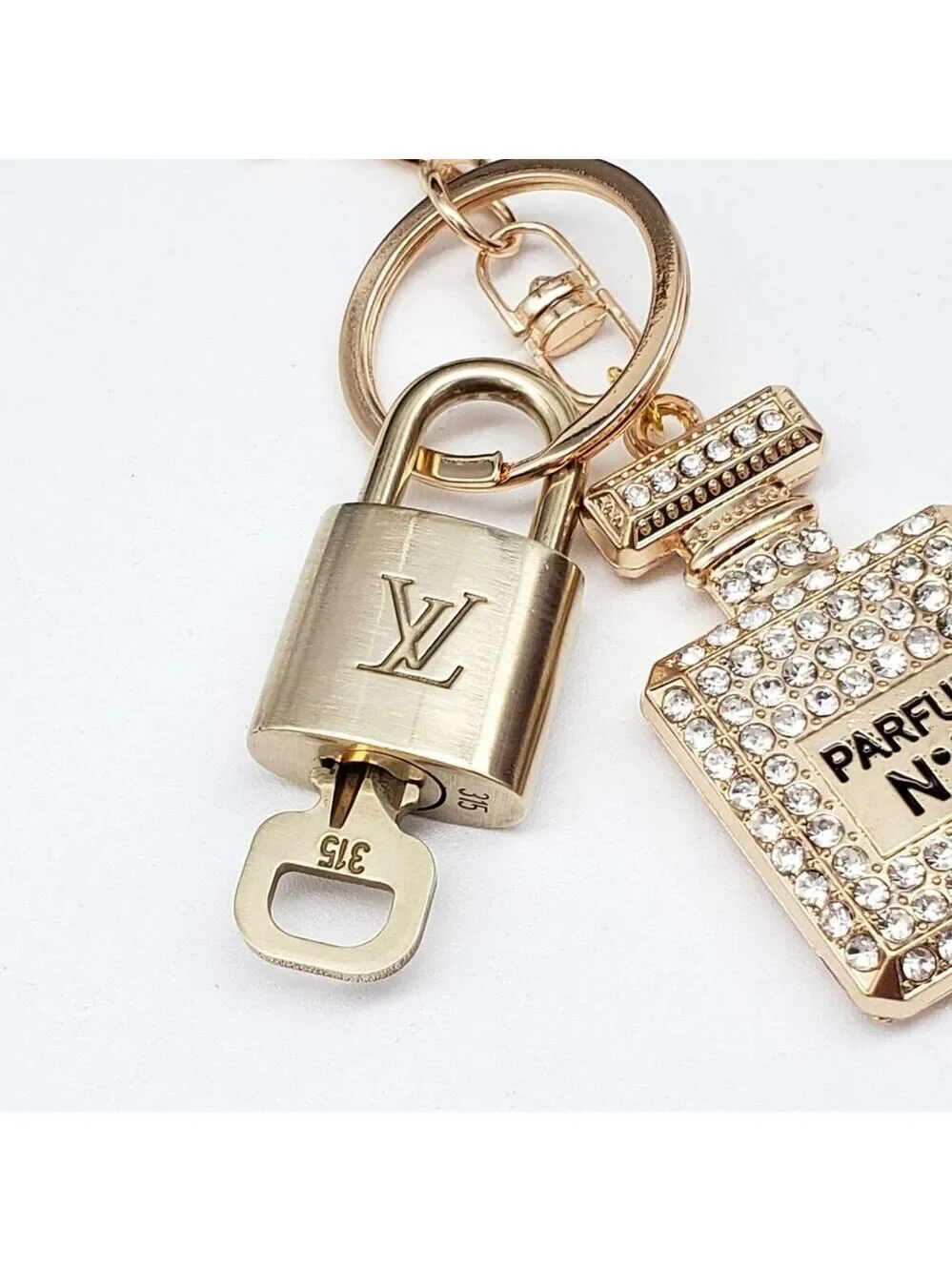 Authentic Louis Vuitton Gold Lock 🔒 Keychain Bag Unbranded N5 Bottle Charm LV